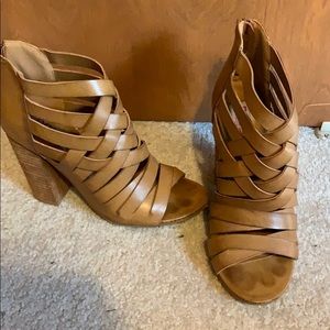 Peep toe leather heel